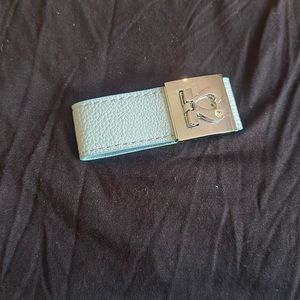 - Heart opening bracelet  leather (synthetic)?